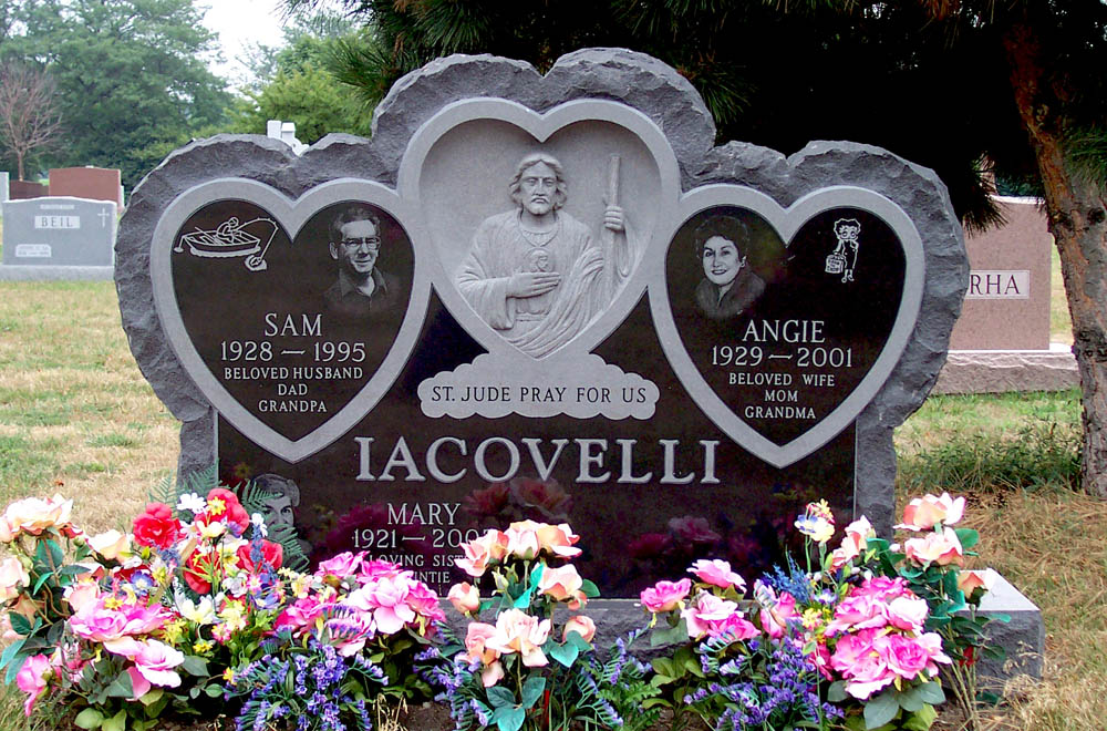 Heart shaped family monument with hand-etched portraits